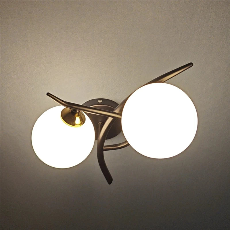 The Duetto Globe Wall Sconce, detail view