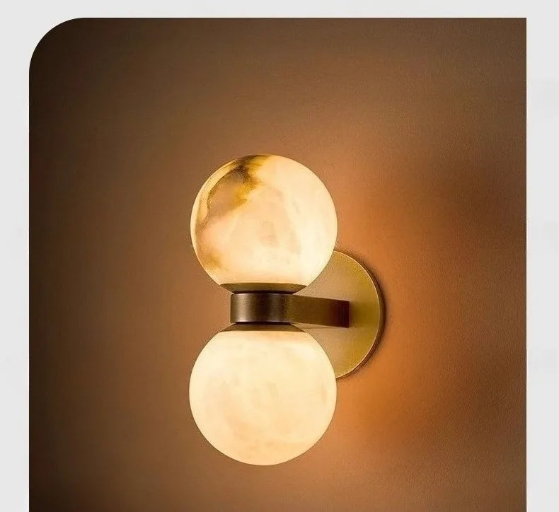 The Luna Alabaster Orb Wall Sconce, detail view
