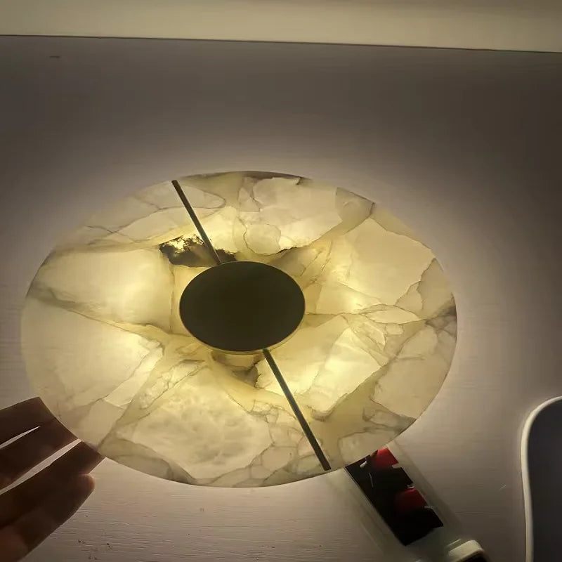 The Tondo Marble Effect Disc Wall Sconce