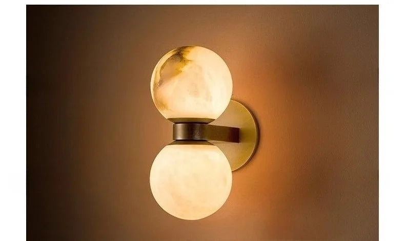 The Luna Alabaster Orb Wall Sconce, detail view