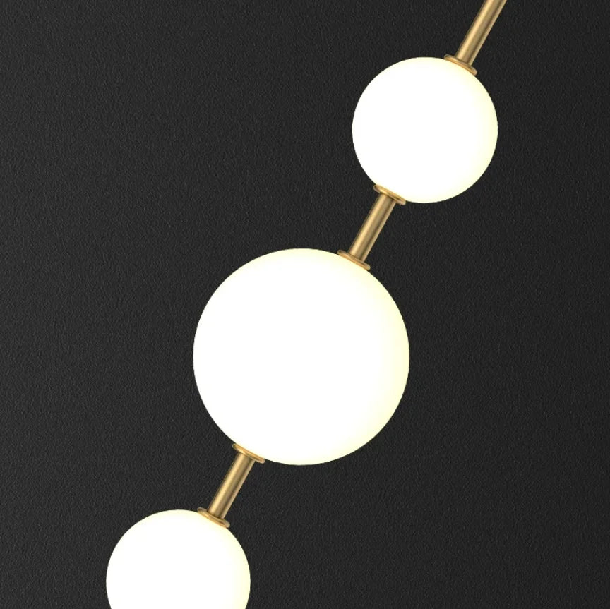 The Cascata Vertical Globe Wall Sconce