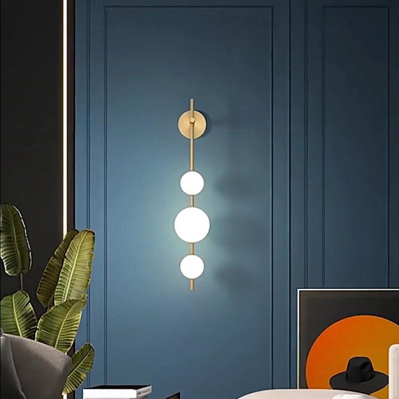 The Cascata Vertical Globe Wall Sconce