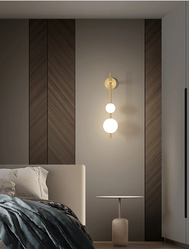 The Cascata Vertical Globe Wall Sconce, detail view